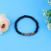 Black Onyx and Tiger Eye Stretch Bracelet in Sterling Silver Bali Beads